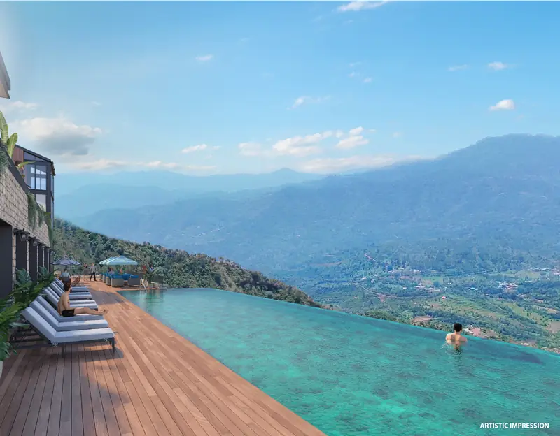 Clubhouse deck with an infinity-edge pool facing the mountains