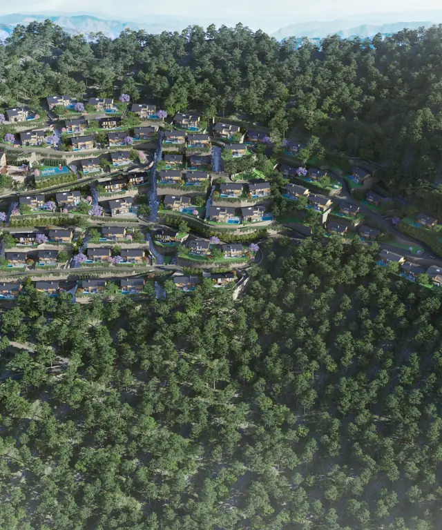 Aerial view of Eldeco Terra Grande: villas spread across a forested hillside