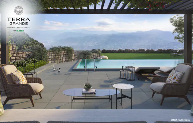 Villa sundeck with lounge chairs and a pool
